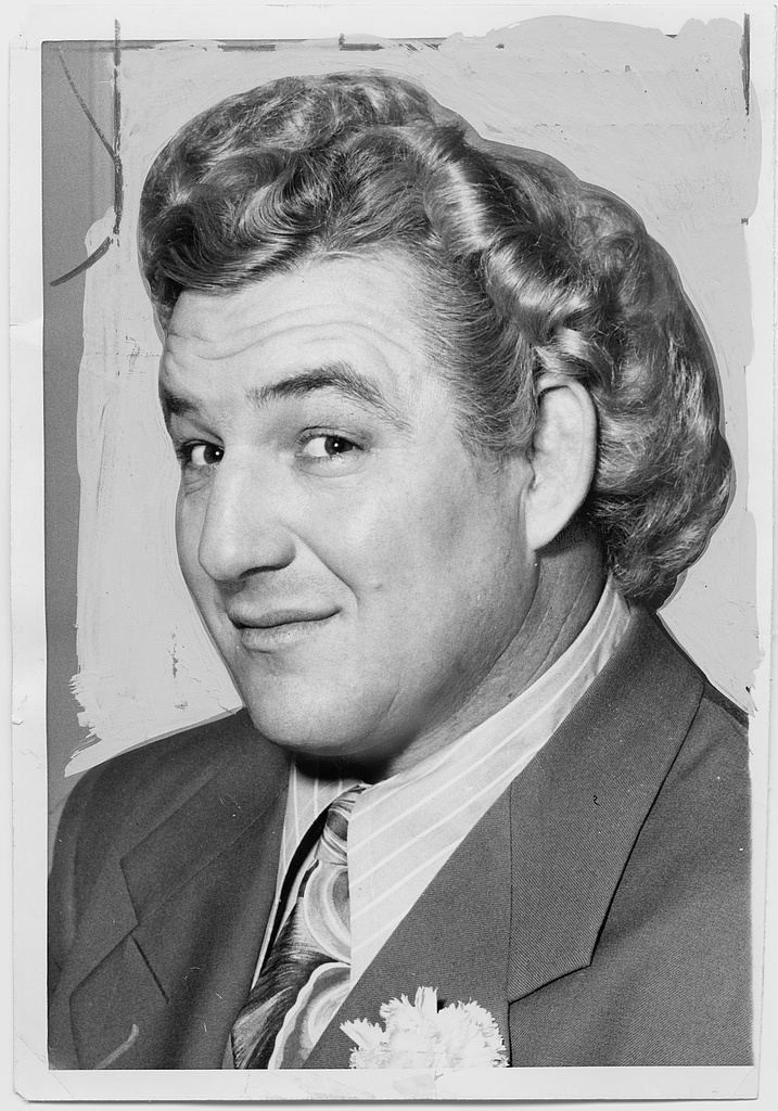 Headshot of Gorgeous George with his famous wavy blond hair