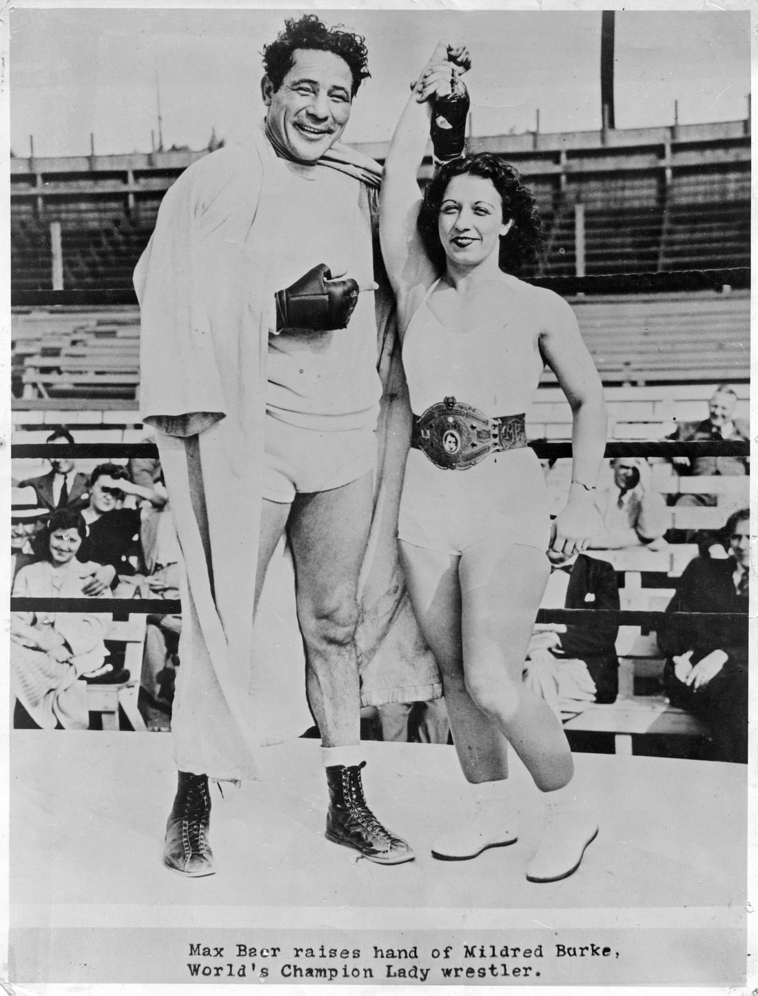 Wrestler Mildred Burke posing with boxing champion Max Baer